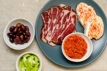 Plate with Bulgarian salami - babek, cheese and chutney