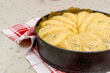 Raw dough in the form for homemade bread