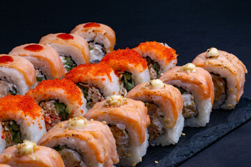 Japanese food. close-up view of delicious sushi set on slate boards