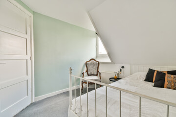 Cozy minimalist style bedroom in the mansard