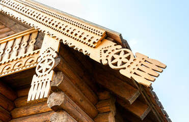 Wooden carved decorations on the roof of a house