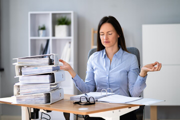 Woman Doing Accounting Stress Management Yoga Exercise