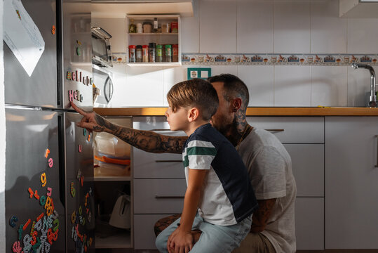 Father and son making words