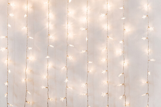 Twinkle lights background on a wall
