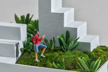 Creative concept with miniature people