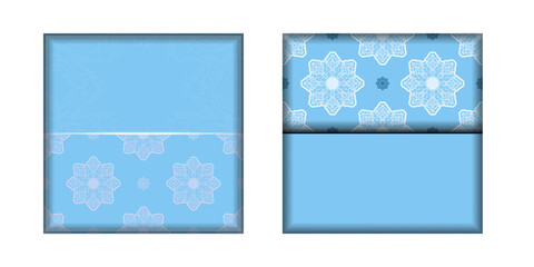 Greeting card template in blue color with luxurious white pattern prepared for printing.