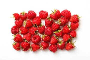 Sweet beautiful raspberries on a white background. Top view. Organic natural berries