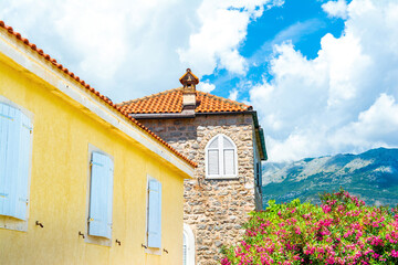 Detailed view of the colorful buildings with tiled roof  in the Old Town of Budva