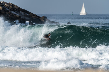 Bodyboarder riding a wave
