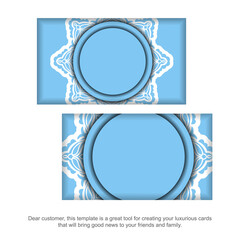 Blue business card template with vintage white ornament for your contacts.