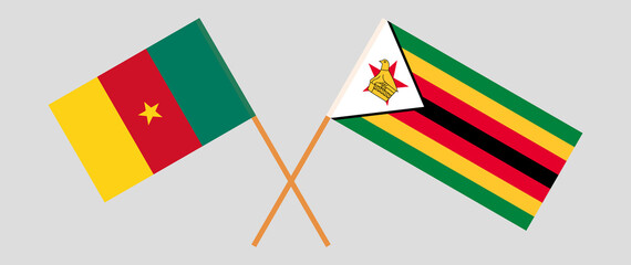 Crossed flags of Cameroon and Zimbabwe. Official colors. Correct proportion