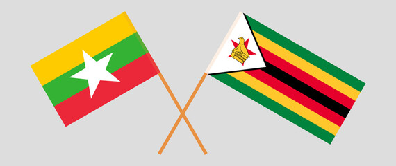 Crossed flags of Myanmar and Zimbabwe. Official colors. Correct proportion