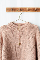 Sweaters on a hanger