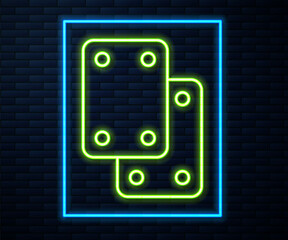 Glowing neon line Knee pads icon isolated on brick wall background. Extreme sport. Skateboarding, bicycle, roller skating protective gear. Vector
