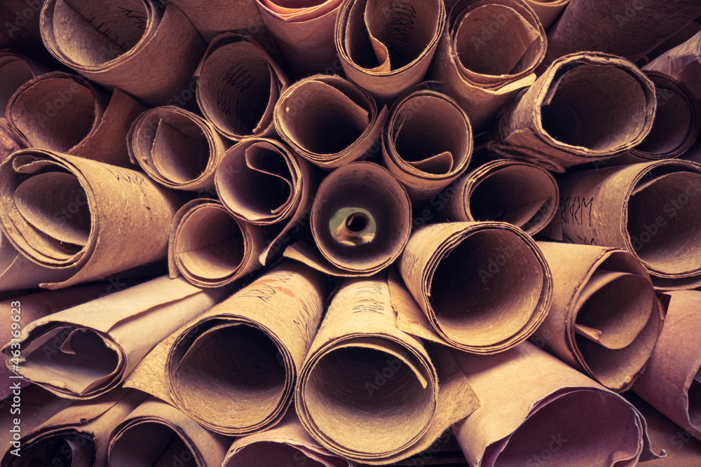 Poster Old scroll library. Stack of ancient scrolls.