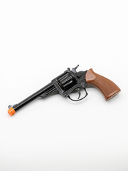 A metal pistol. A child's toy for playing war..