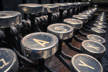 Antique machine to write. Office equipment. Keyboard of vintage typewriter.