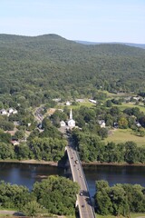 mountain view town river bridge