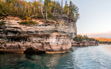 Pictured Rocks along the shore of Lake Superior on autumn under sunset