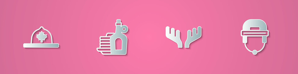 Set paper cut Canadian ranger hat, Syrup with pancakes, Deer antlers and Hockey helmet icon. Paper art style. Vector