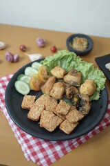 tempeh, tofu, chicken salad with bean sprouts