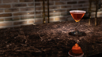 Cocktail glass on the bar counter