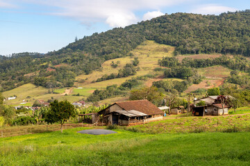 Fototapeta na wymiar Farm with house, fields and forest
