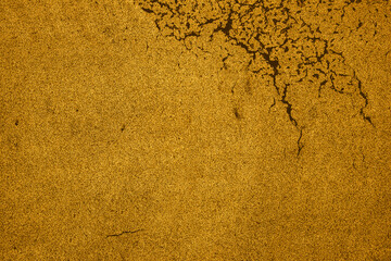 fond abstrait jaune de craquelures de peinture.