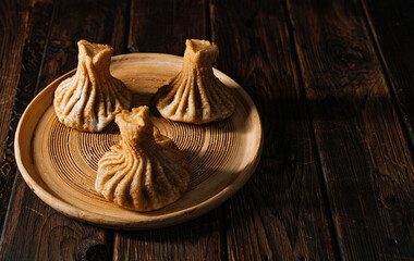 fried khinkali on a plate. Georgian cuisine. High quality photo