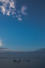 Blue sky and wind power generators.