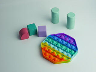 hexagon pop it fidget toy and colorful cube blocks