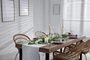 Festive table setting with beautiful tableware and decor indoors