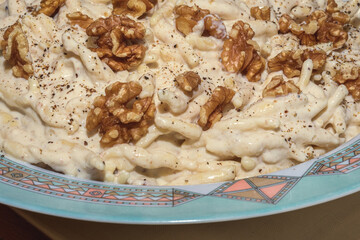 Italian Trofie Pasta With Ricotta Cheese, Walnuts And Black Pepper