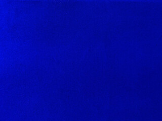 Blue velvet fabric texture used as background. Empty blue fabric background of soft and smooth textile material. There is space for text..