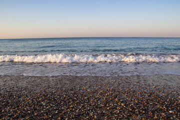 Beautiful seascape with sea waves and sand. Sea waves on the beach.