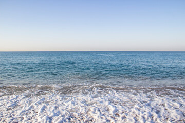 Beautiful seascape with sea waves and sand. Sea waves on the beach.