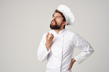 male cook kitchen Job hand gestures light background