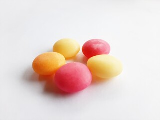 colored candy on a white background