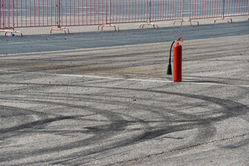 fire extinguishers are on the pit lane of the autodrome. Fire safety equipment. Special equipment in case of fire