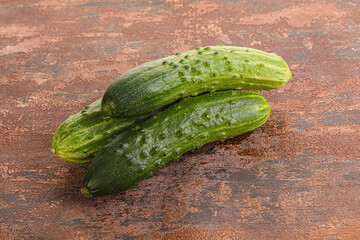 Fersh juicy green cucumbers heap