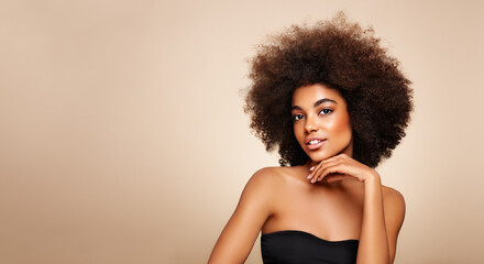 Beauty portrait of African American girl with afro hair. Beautiful black woman. Cosmetics, makeup and fashion - obrazy, fototapety, plakaty