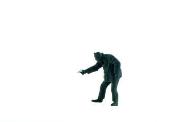 Miniature people office, worker, police and thief concept in variety action on white background