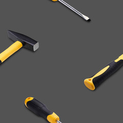 Set of hand tools on a bright background, seamless pattern.