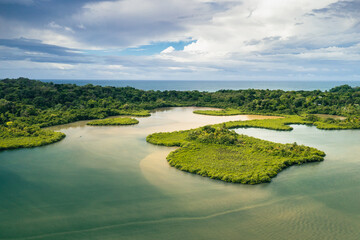 Panama.Tropical Island Aerial View. Wild coastline lush exotic green jungle. Red Frog Beach in...