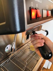 
creating a cup of fragrant coffee in a coffee machine