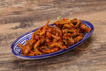 Canned anchovy in tomato sauce