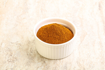 Dry Paprika powder in the bowl