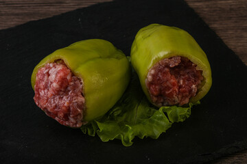 Raw stuffed bell pepper with meat