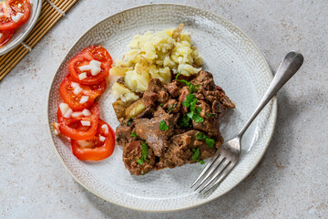 Chicken liver and chorizo in creamy sauce
