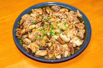 A delicious steamed chicken with shiitake mushrooms